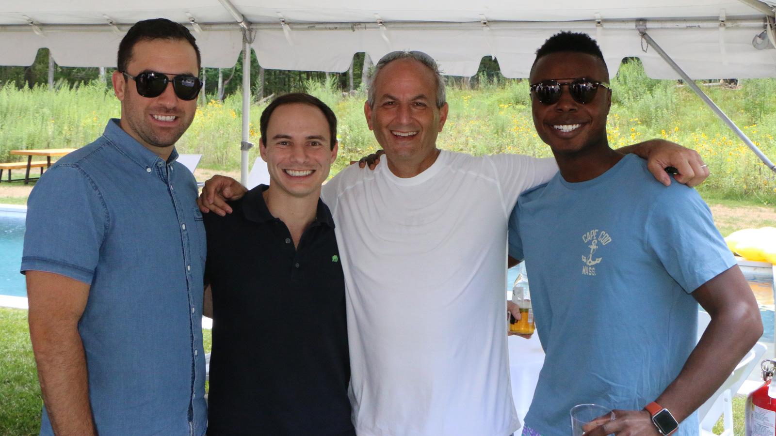 Group photo at backyard party.