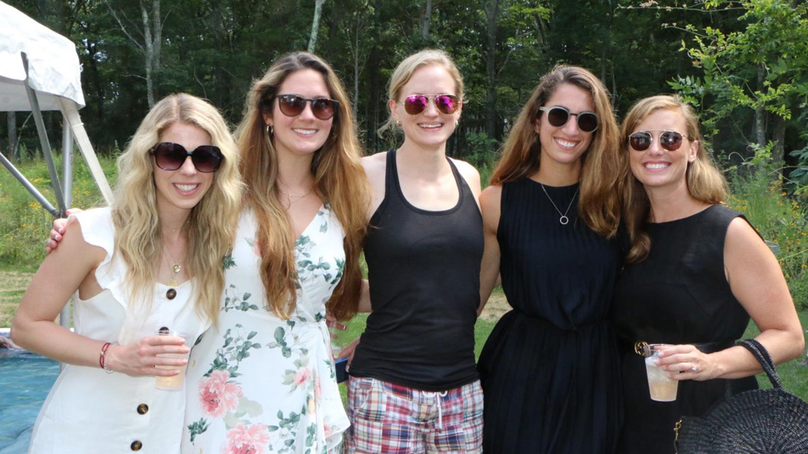 Group of women at outdoor party.