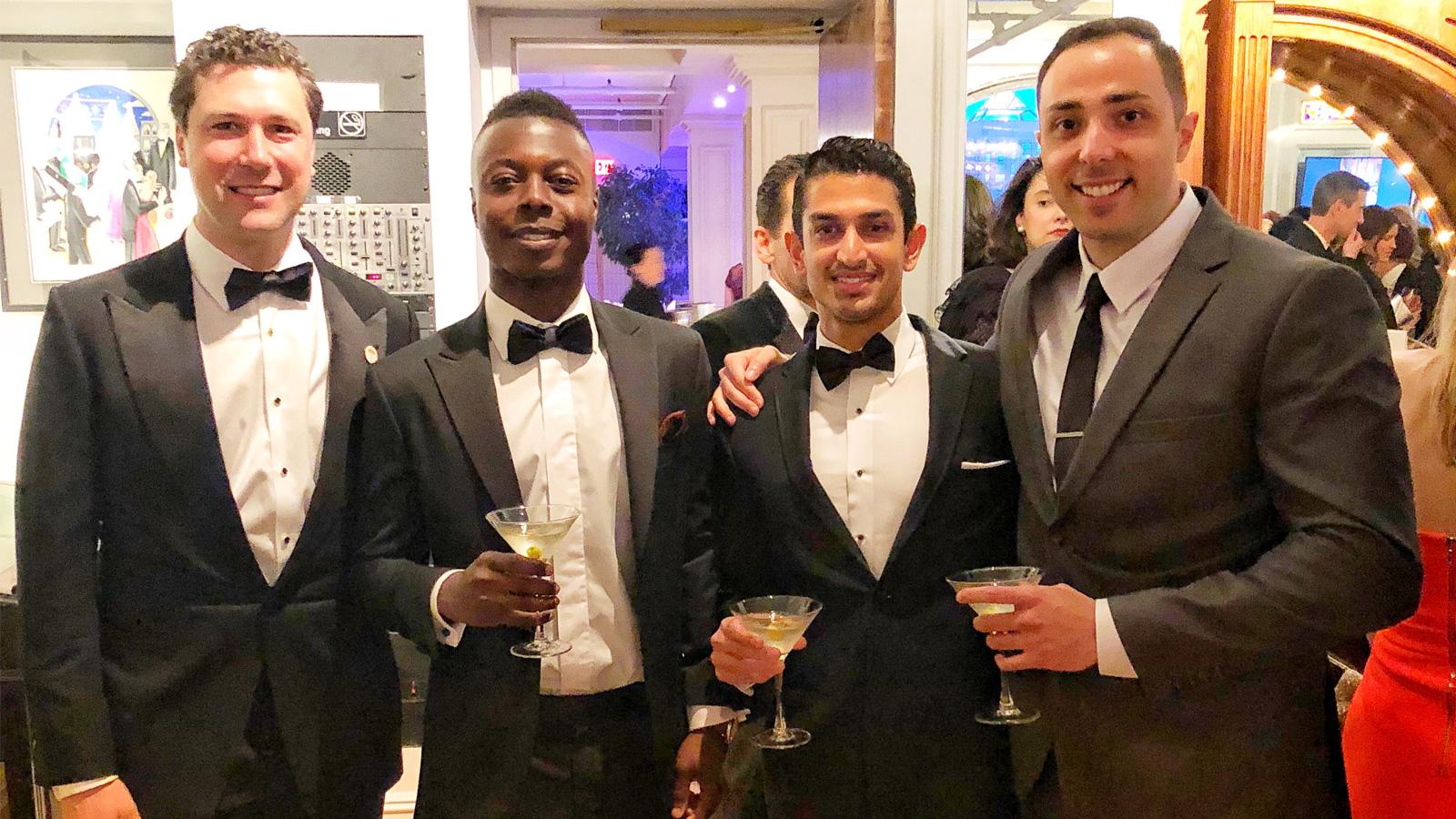 Group photo at formal event.