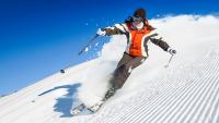 Woman downhill skiing