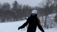 Mia snowboarding after spine surgery
