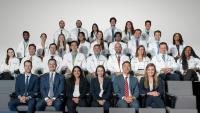 Group shot of current residents, including the class of 2026