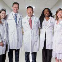 Class of 2028 L-R: Michaela O'Connor, MD; Alex Ruberto, MD; Kyle Obana, MD; Tiffany Smith, MD, MS; Natalia Czerwonka, MD; Not pictured Beth Ashinsky, MD, PhD